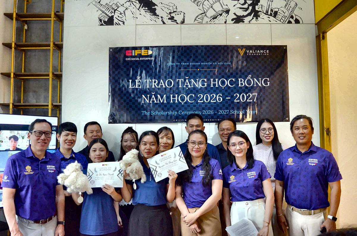 Students receiving their certificates at the scholarship ceremony